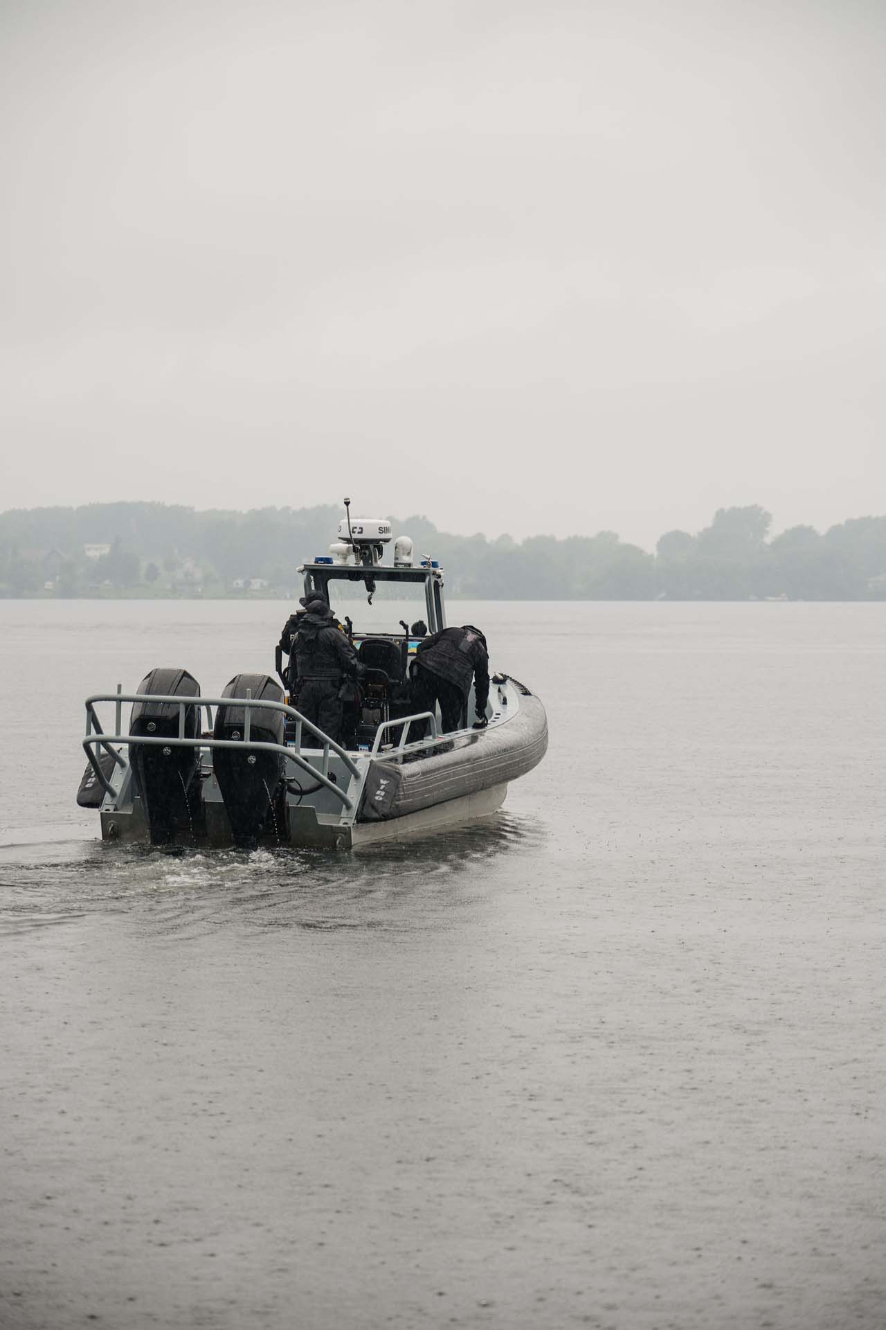 Akwesasne Mohawk police officers on a boat