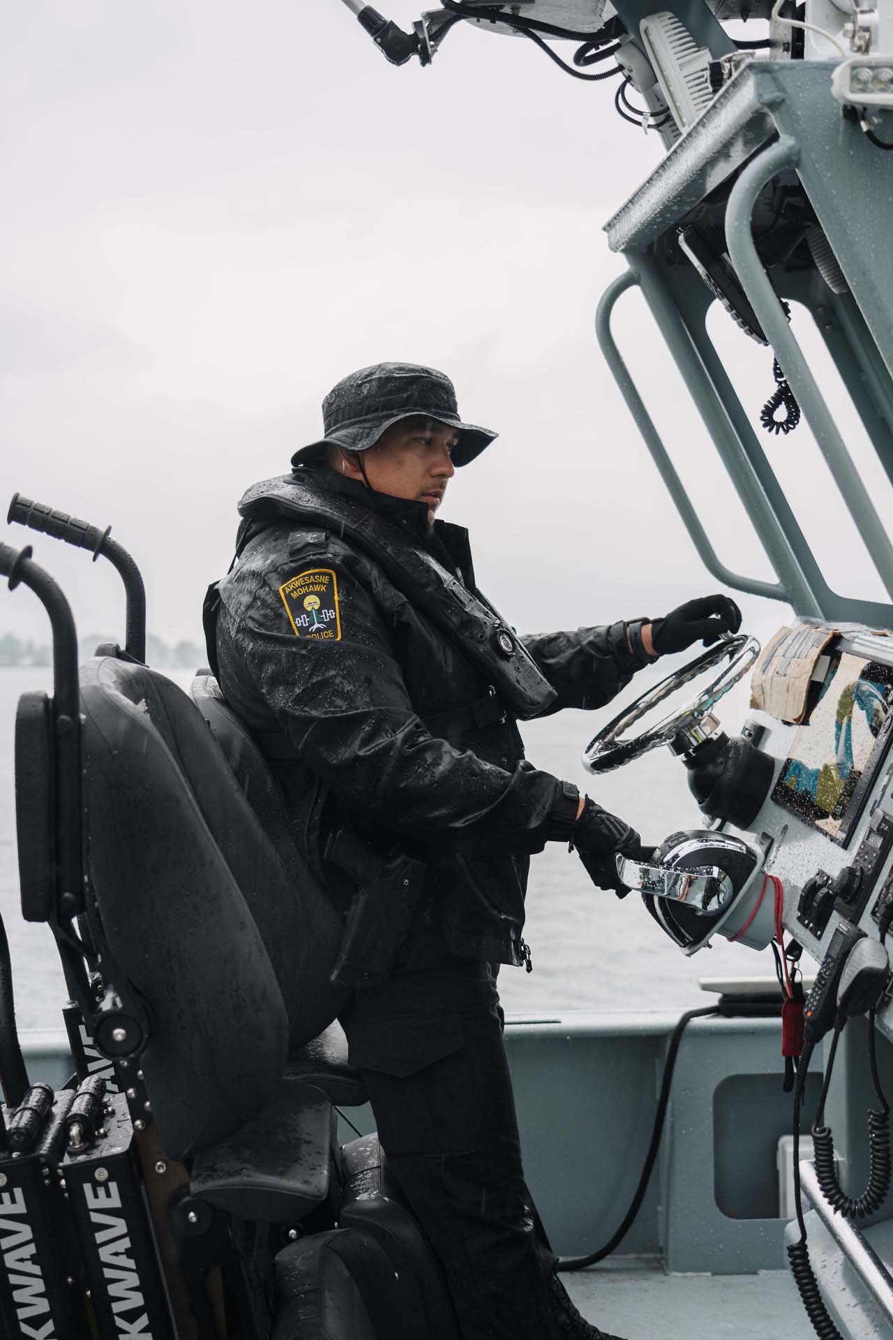 Akwesasne Mohawk police officer on a boat