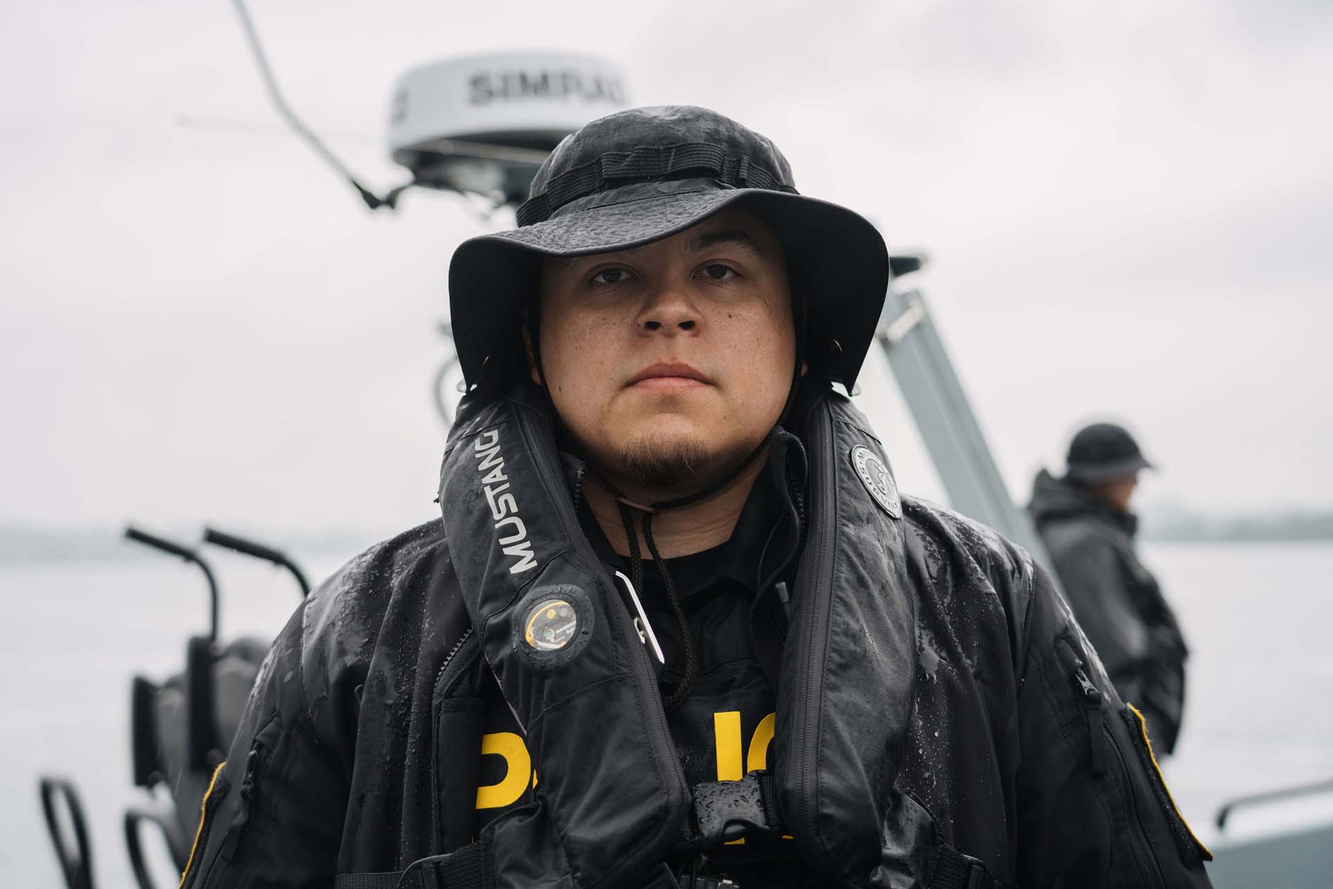 Akwesasne Mohawk police officers on a boat