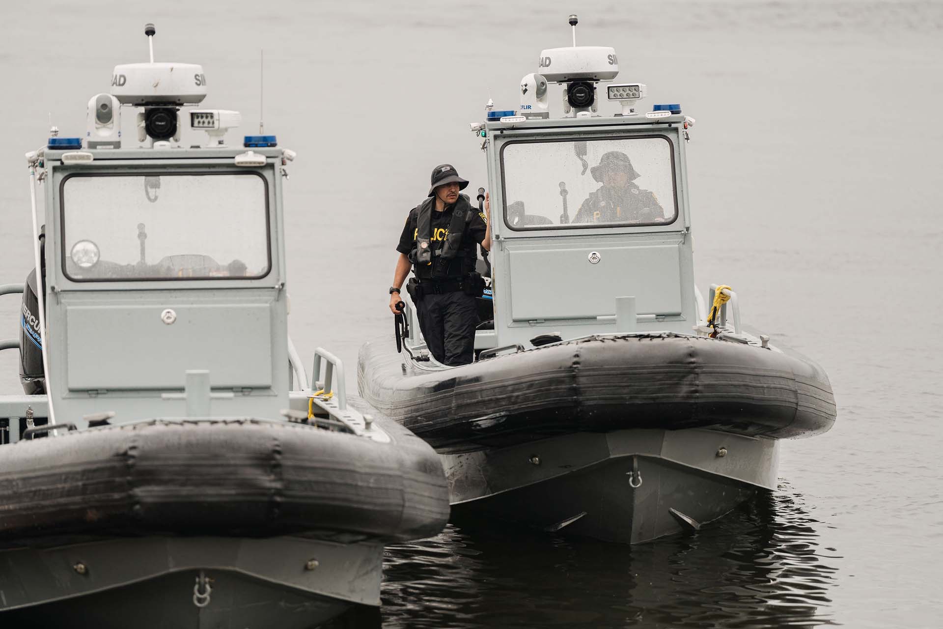 Akwesasne Mohawk police officers on a boat