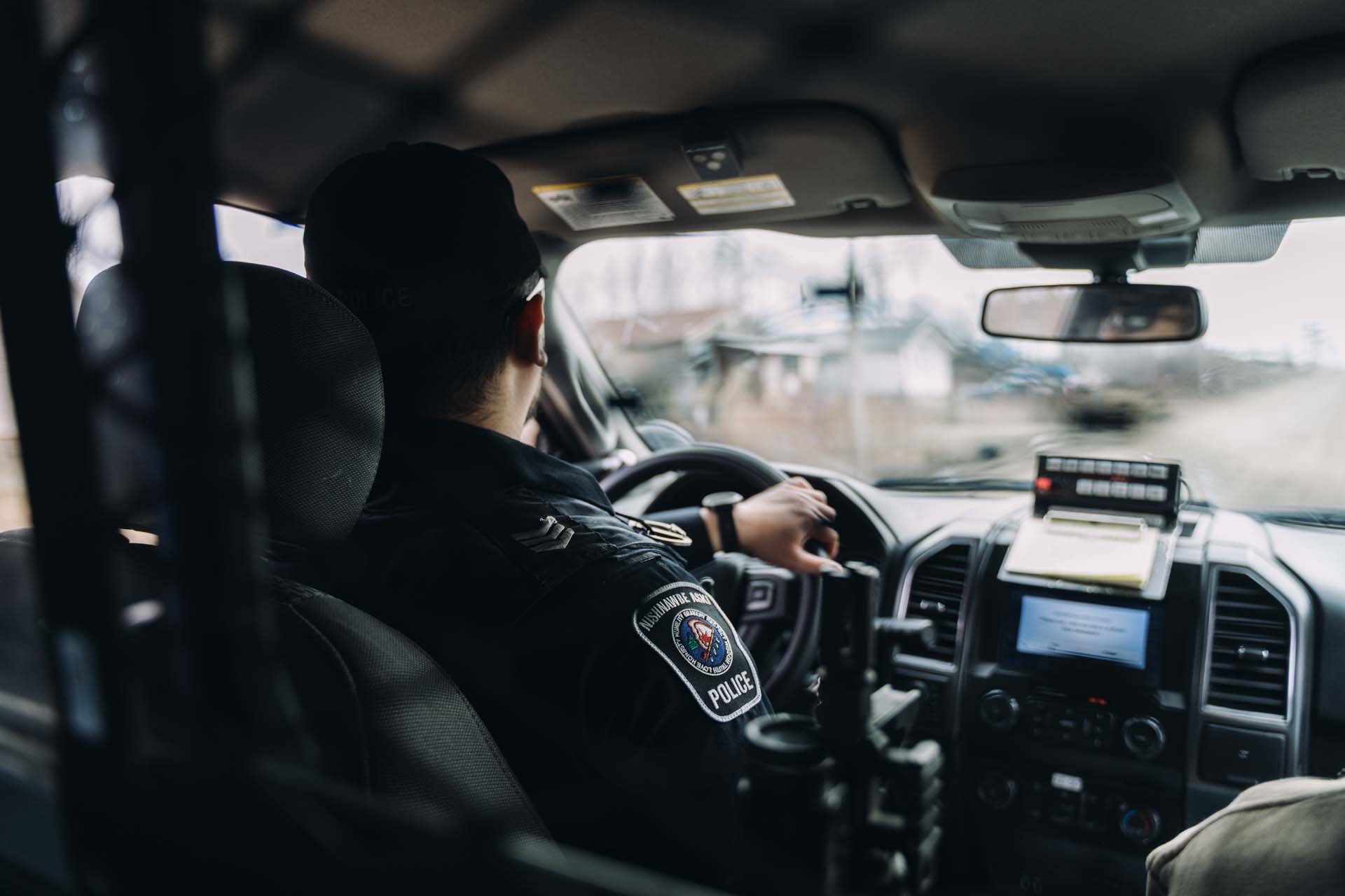 Nishnawbe Aski Police Service officer in a vehicle